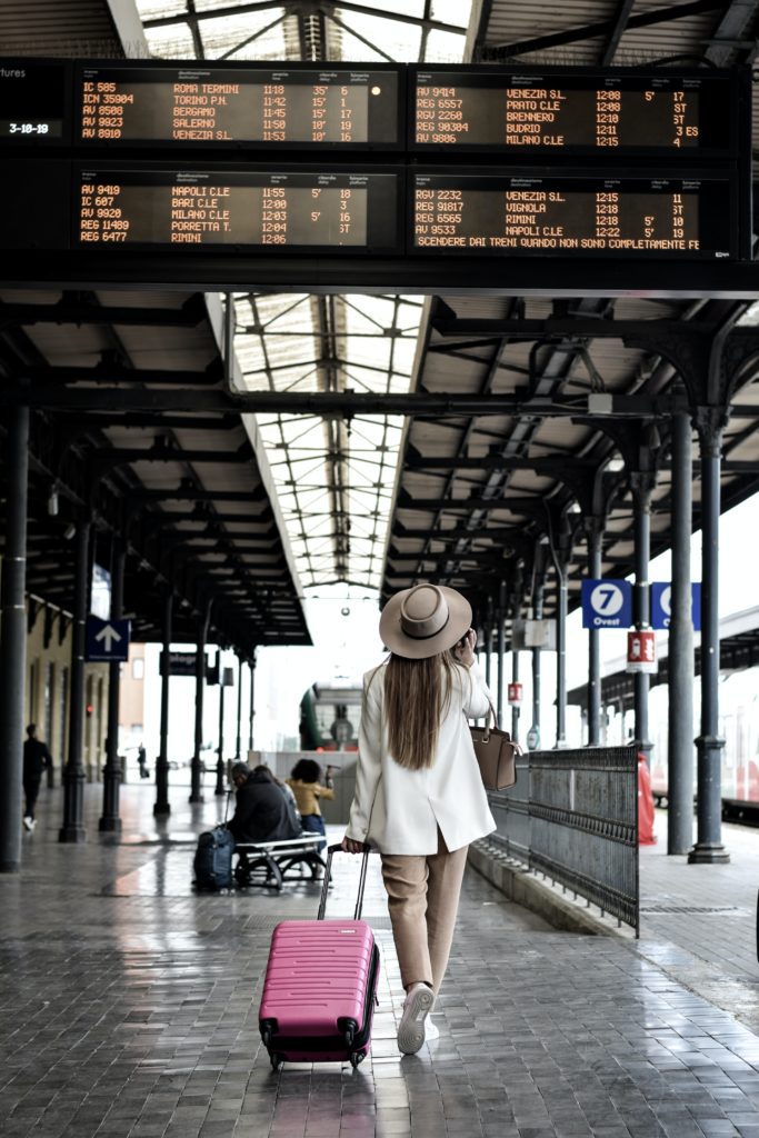 woman taking a train in Bologna
